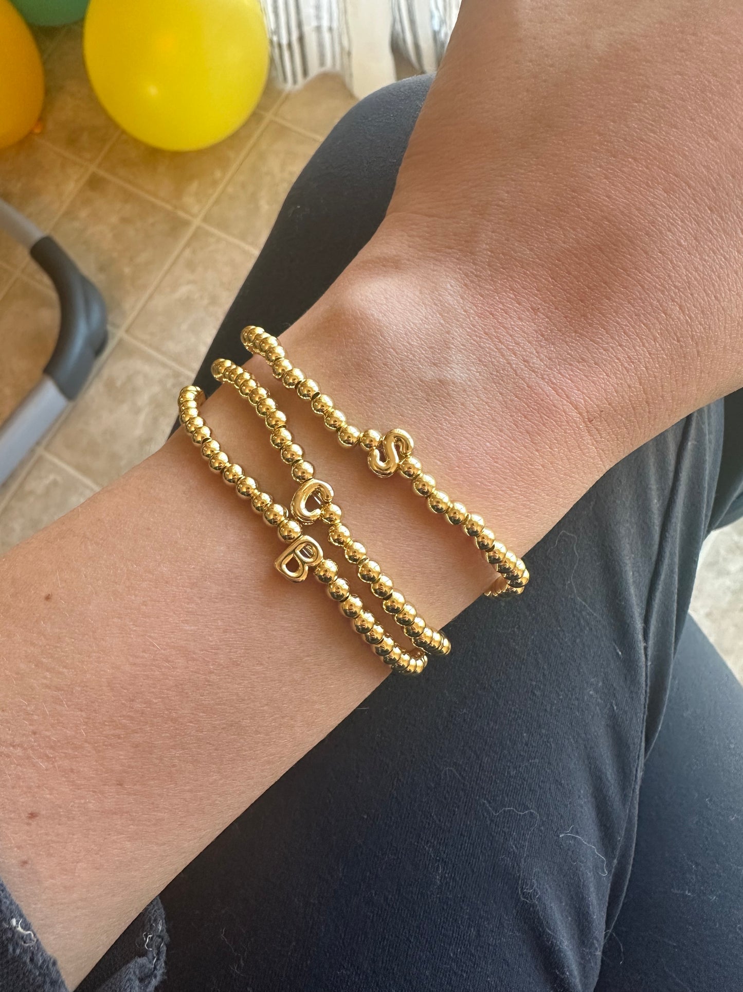 Gold initial bracelets